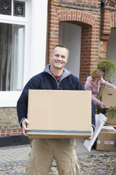 Removal team loading boxes and furniture for a Camdentown home move