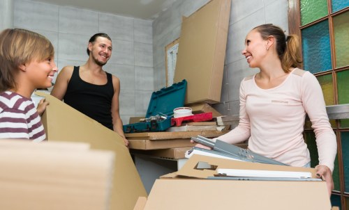 Removal team protecting furniture during a safe house move