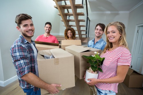 Removal team planning a safe move with packing equipment