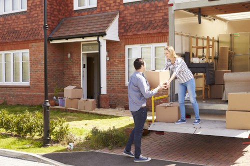 Removals service in Camden Town with moving boxes and furniture
