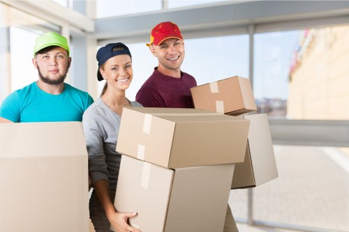 Packed boxes and household items arranged inside a moving truck
