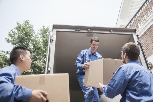 A local packing team preparing a room for relocation