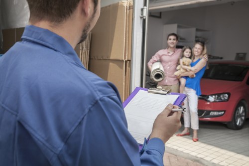 Packed moving boxes and furniture prepared for collection in Camdentown