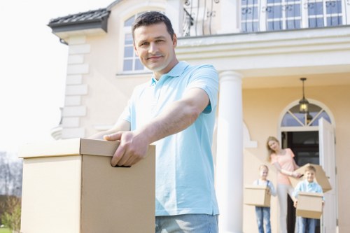Free quotation paperwork beside packed moving boxes