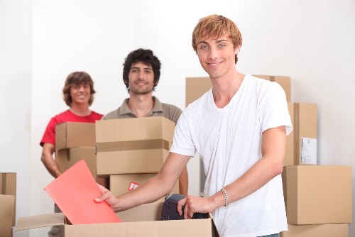 Loading furniture and boxes into a van for a Camdentown move